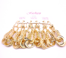 Cargar imagen en el visor de la galería, Looped ring on a hanging chain