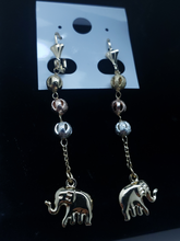 Load image into Gallery viewer, Hollow shimmering tri color ornament balls with hanging elephants