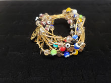 Cargar imagen en el visor de la galería, Multi colored Turkish eyes with crystals and hanging pendants