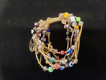 Cargar imagen en el visor de la galería, Multi colored Turkish eyes with crystals and hanging pendants
