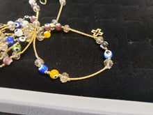 Cargar imagen en el visor de la galería, Multi colored Turkish eyes with crystals and hanging pendants