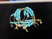 Cargar imagen en el visor de la galería, Aqua blue crystal and pearls bangle with hanging pendants