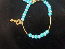 Cargar imagen en el visor de la galería, Aqua blue crystal and pearls bangle with hanging pendants