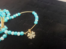 Cargar imagen en el visor de la galería, Aqua blue crystal and pearls bangle with hanging pendants