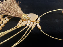 Load image into Gallery viewer, Cream colored crystal Bangle with ornament and hanging heart shaped pendant