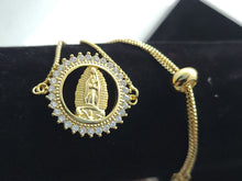 Cargar imagen en el visor de la galería, Our Lady of Guadalupe in hollow circle with clear color crystals edge (bracelet)