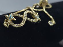 Cargar imagen en el visor de la galería, Infinity sign with clear crystals and blue crystal stars (bracelet)