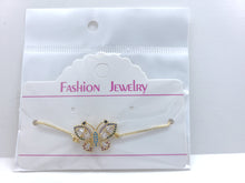 Cargar imagen en el visor de la galería, Hollow tipped Butterfly with blue and clear crystals (bracelet)