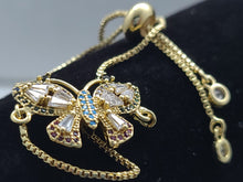 Cargar imagen en el visor de la galería, Hollow tipped Butterfly with blue and clear crystals (bracelet)