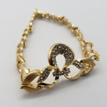 Cargar imagen en el visor de la galería, Laminated ribbon with hole design with clear crystals (sets)