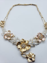 Load image into Gallery viewer, Gold rose design with clear crystals (set)