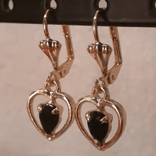 Load image into Gallery viewer, Small hanging hollow hearts with a black crystal center