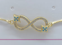 Cargar imagen en el visor de la galería, Infinity sign with clear crystals and blue crystal stars (bracelet)