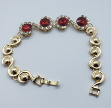 Cargar imagen en el visor de la galería, Large red crystal circles surrounded with clear crystals (set)