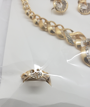 Cargar imagen en el visor de la galería, Laminated ribbon with hole design with clear crystals (sets)