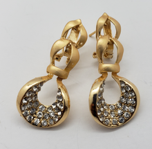 Cargar imagen en el visor de la galería, Laminated ribbon with hole design with clear crystals (sets)