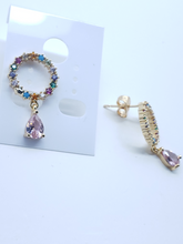 Cargar imagen en el visor de la galería, Multi colored crystal hollow circle with hanging pink crystal