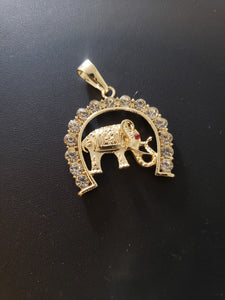Elephant with crystals in hollow upside down horseshoe