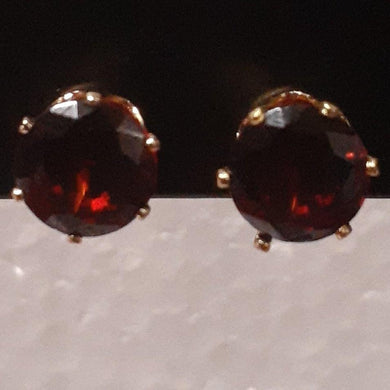 Small round red crystals