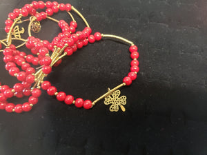 Cherry red pearl bangle with hanging pendants