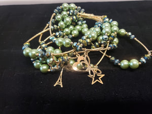 Litmus multi size crystals and green pearls with hanging pendants
