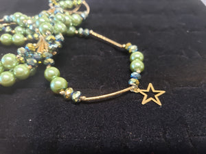 Litmus multi size crystals and green pearls with hanging pendants