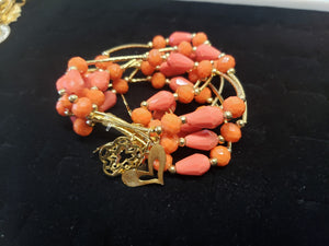 Pink & Orange colored crystal bangles with hanging pendants