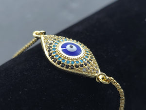 Blue Evil Turkish Eye surrounded by tri color crystals (bracelet)