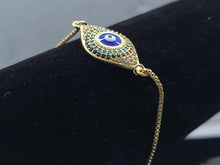 Load image into Gallery viewer, Blue Evil Turkish Eye surrounded by tri color crystals (bracelet)
