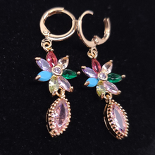 Load image into Gallery viewer, Multi color flower with a hanging pink crystal
