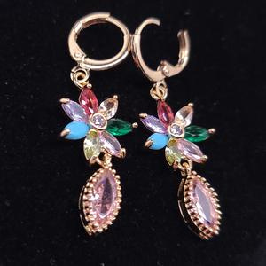 Multi color flower with a hanging pink crystal