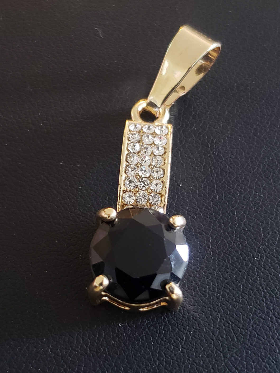 Black crystal with clear crystals