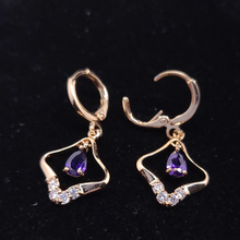 Cargar imagen en el visor de la galería, Hollow diamond shaped with hanging purple crystal
