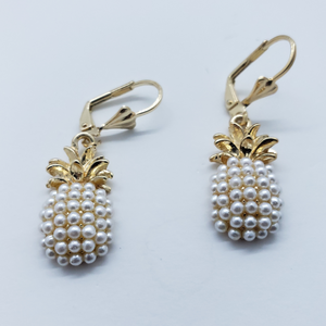 pearl pineapple with gold top and crystals