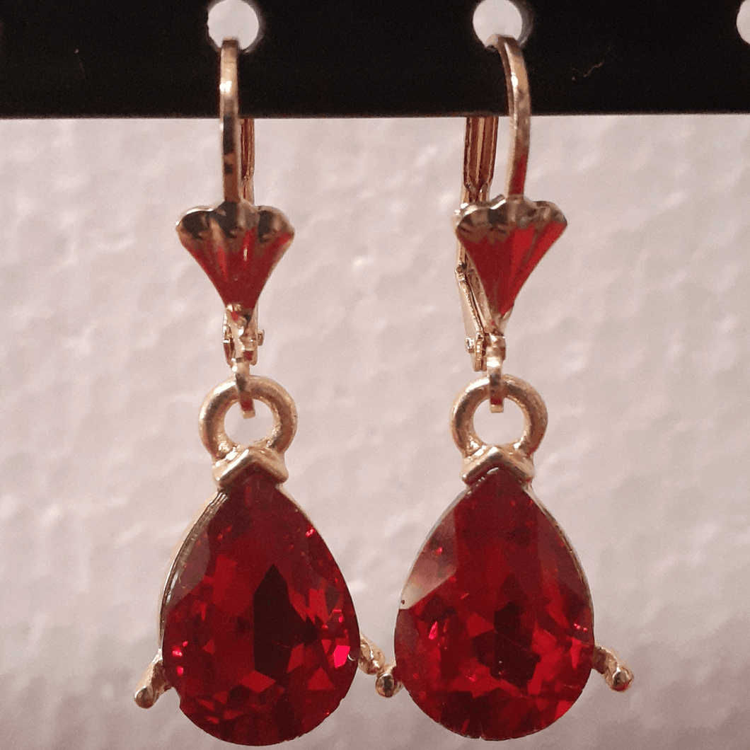 Small hanging red oval crystal