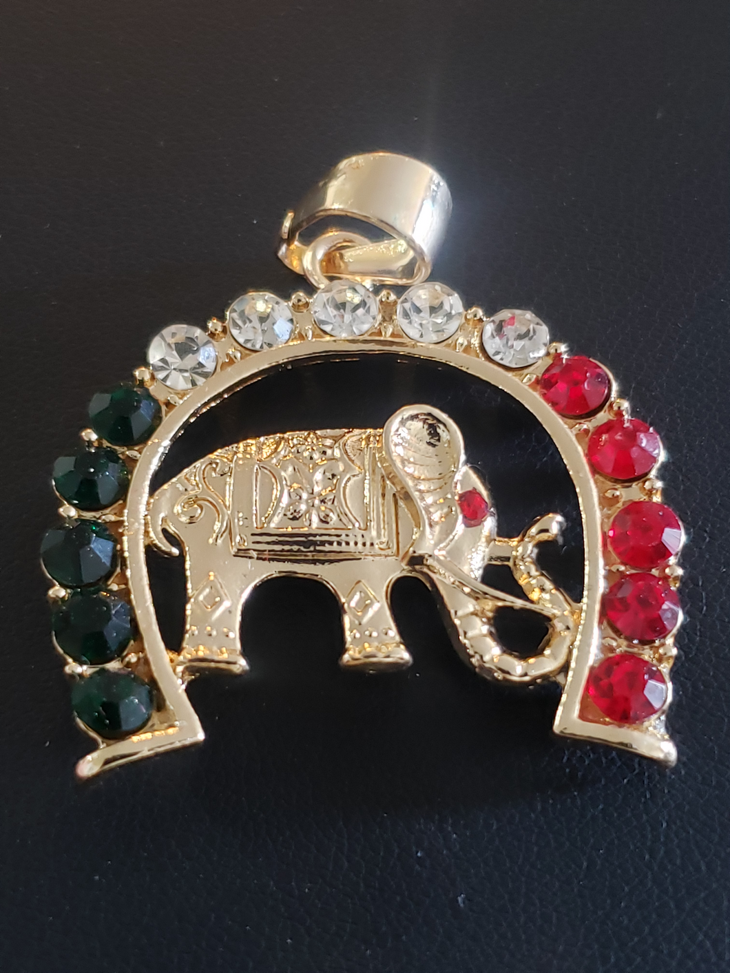 Tri color elephant pendant in upside down horseshoe