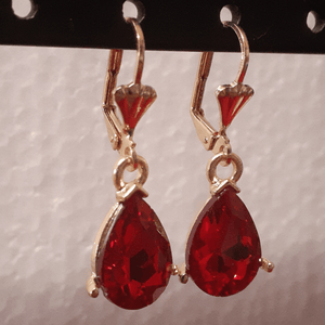 Small hanging red oval crystal