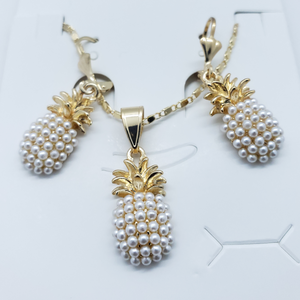 pearl pineapple with gold top and crystals