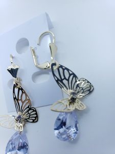 Flapping butterfly with a clear crystal