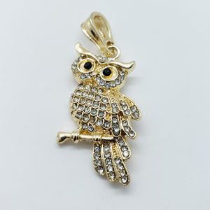 Laminated owl on branch with clear crystals
