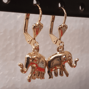 Small laminated elephant with clear crystal eyes