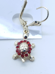 Small laminated turle with red crystal back