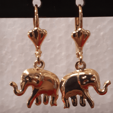 Small laminated elephant with clear crystal eyes