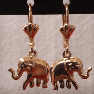 Small laminated elephant with clear crystal eyes